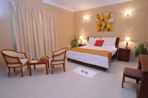 Le Grand Hotel Doha Habitación foto